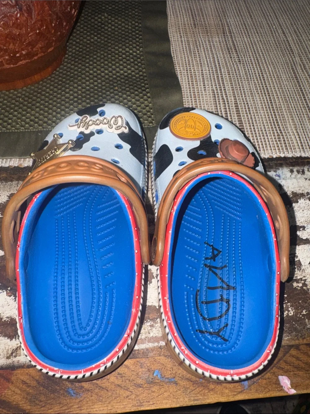 CROCS Kids Woody Toy Story with Charms - Light Blue, Red & Brown Size 1